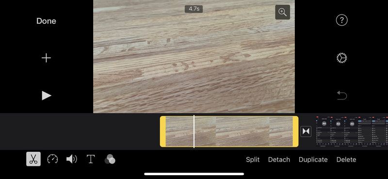 Screenshot of the iMovie app for iPhone in the editor view.